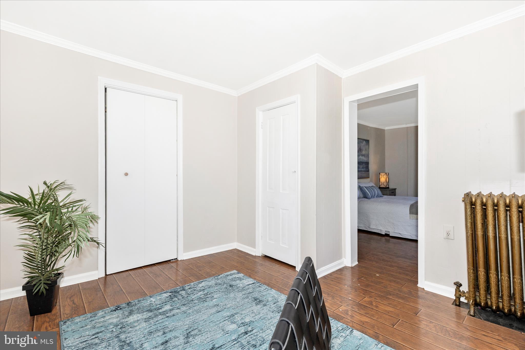 517 West Potomac Street Brunswick, MD 21716 - Photo 19 of 36 a bedroom with a bed and a hallway