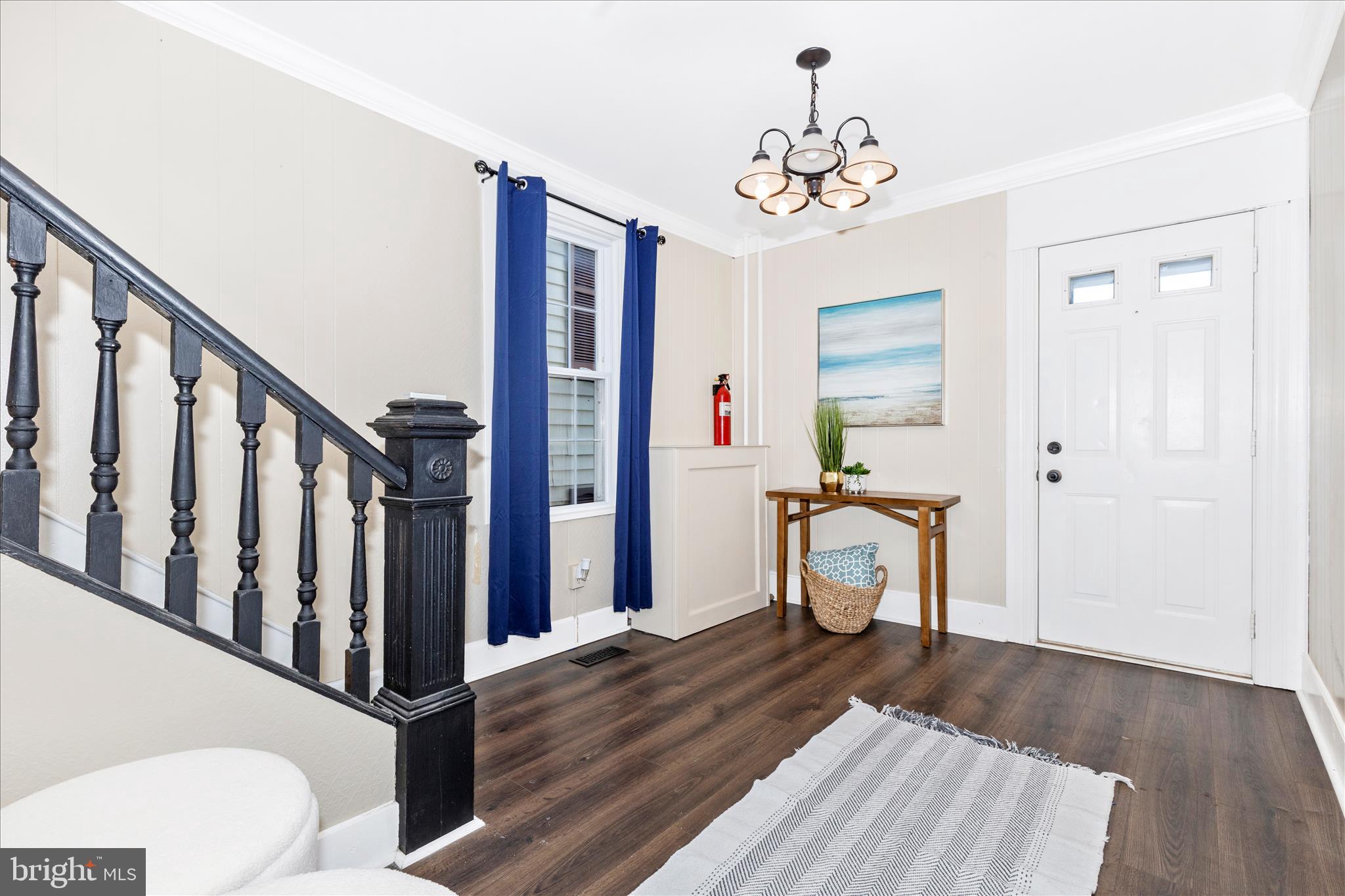 517 West Potomac Street Brunswick, MD 21716 - Photo 2 of 36 a view of a hallway with wooden floor and staircase