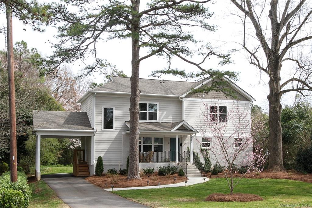4217 Walker Road Charlotte, NC 28211 - Photo 2 of 34 front view of a house with a yard
