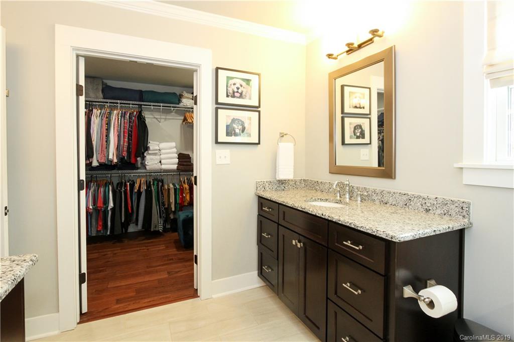 4217 Walker Road Charlotte, NC 28211 - Photo 19 of 34 a bathroom with a sink and a mirror