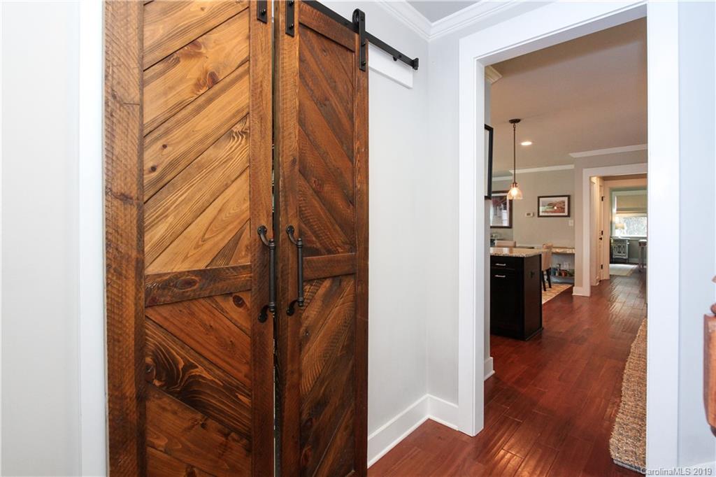 4217 Walker Road Charlotte, NC 28211 - Photo 21 of 34 a view of entryway and hall with wooden floor