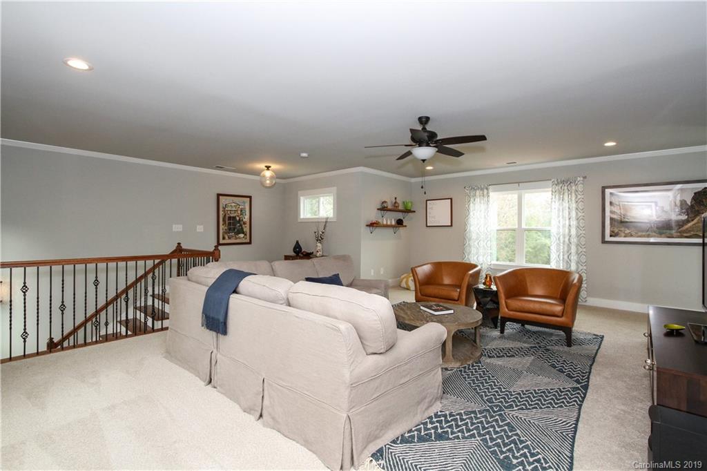 4217 Walker Road Charlotte, NC 28211 - Photo 25 of 34 a living room with furniture and a window