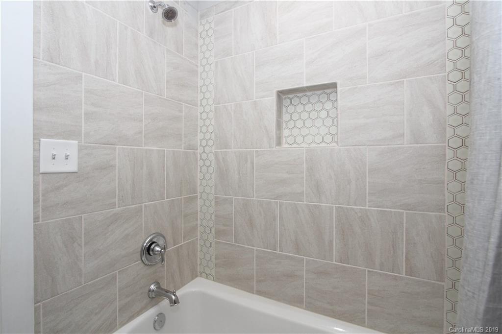 4217 Walker Road Charlotte, NC 28211 - Photo 29 of 34 a bathroom with a shower