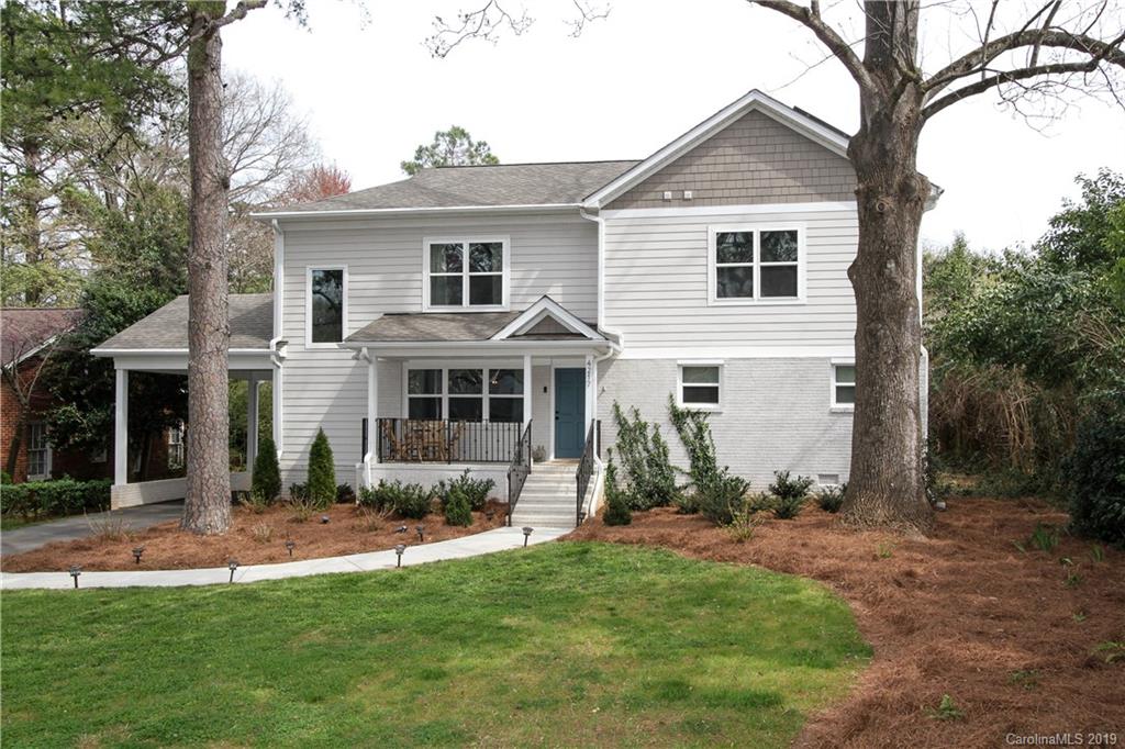 4217 Walker Road Charlotte, NC 28211 - Photo 34 of 34 a front view of a house with a yard and trees