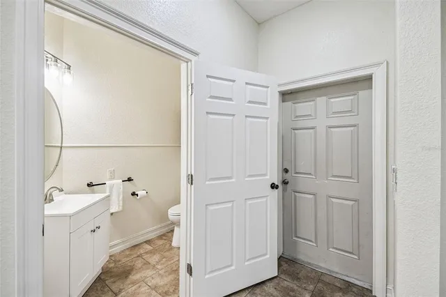 a view of a livingroom with furniture and a flat screen tv