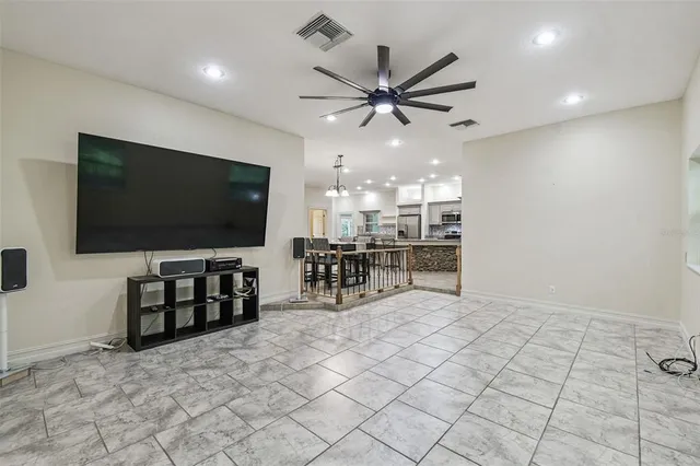 a bathroom with a tub a sink and a shower