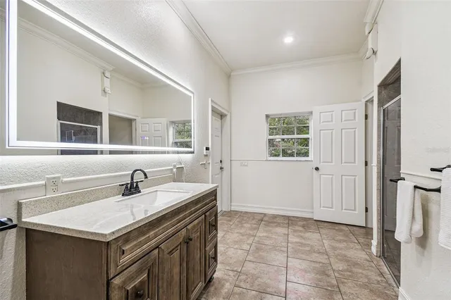 a view of a glass door and a yard