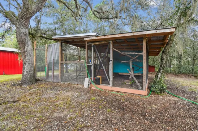a kitchen with a sink a refrigerator and window