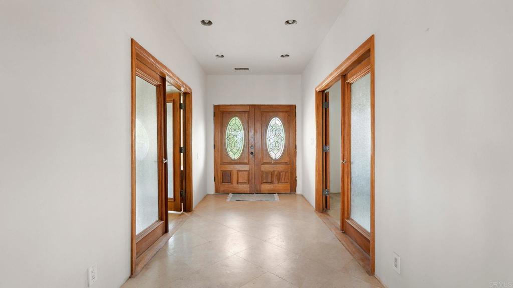 45620 Lewis Valley Road Hemet, CA 92544 - Photo 19 of 53 a view of an empty room and a window