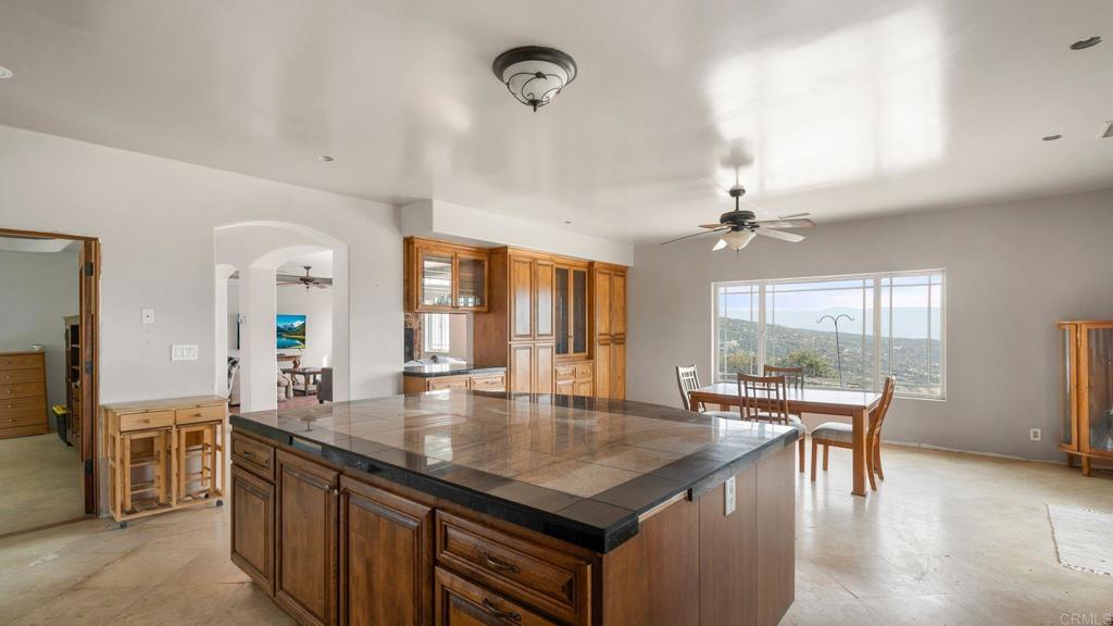 45620 Lewis Valley Road Hemet, CA 92544 - Photo 2 of 53 a kitchen with stainless steel appliances granite countertop a stove and refrigerator