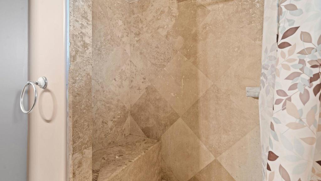 45620 Lewis Valley Road Hemet, CA 92544 - Photo 25 of 53 a bathroom with a shower curtain
