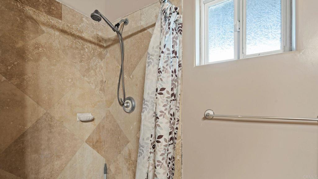 45620 Lewis Valley Road Hemet, CA 92544 - Photo 27 of 53 a bathroom with a shower