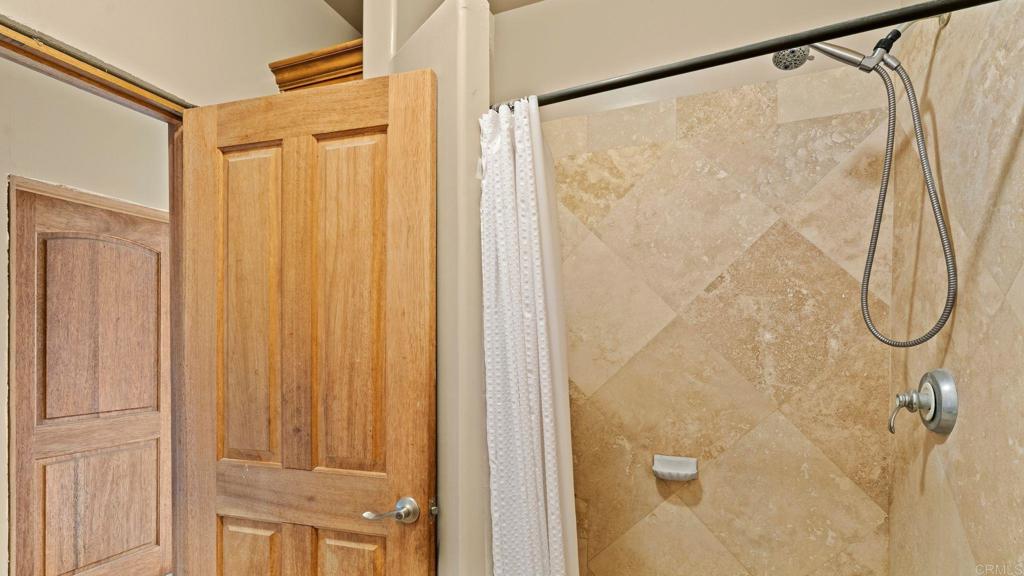 45620 Lewis Valley Road Hemet, CA 92544 - Photo 28 of 53 a bathroom with a shower