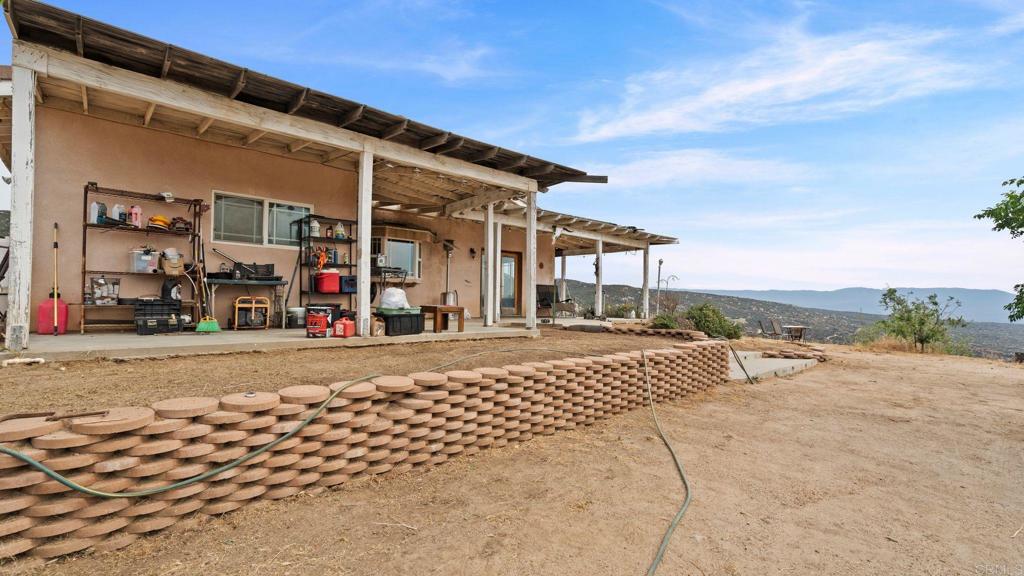 45620 Lewis Valley Road Hemet, CA 92544 - Photo 38 of 53 a view of a house with a patio