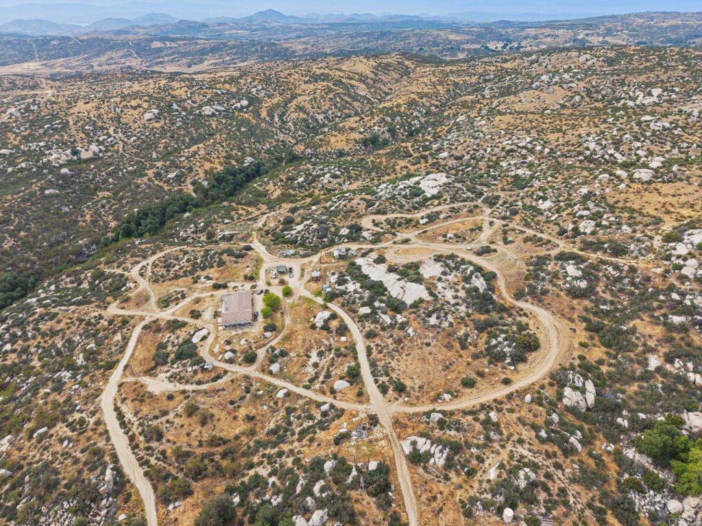 45620 Lewis Valley Road Hemet, CA 92544 - Photo 47 of 53 an aerial view of residential houses with outdoor space
