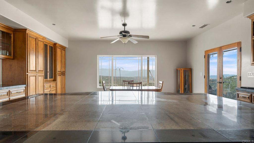 45620 Lewis Valley Road Hemet, CA 92544 - Photo 5 of 53 a view of a livingroom with furniture window and wooden floor