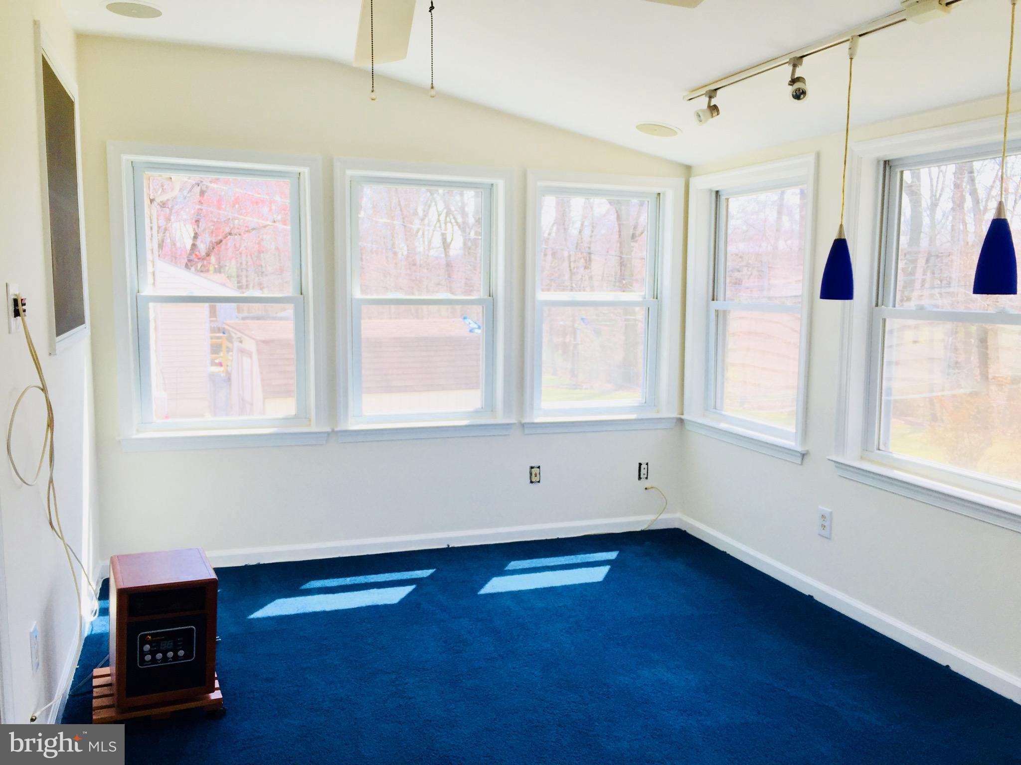 638 Hornbeam Road Edgewood, MD 21040 - Photo 5 of 14 a view of an empty room with a window and wooden floor