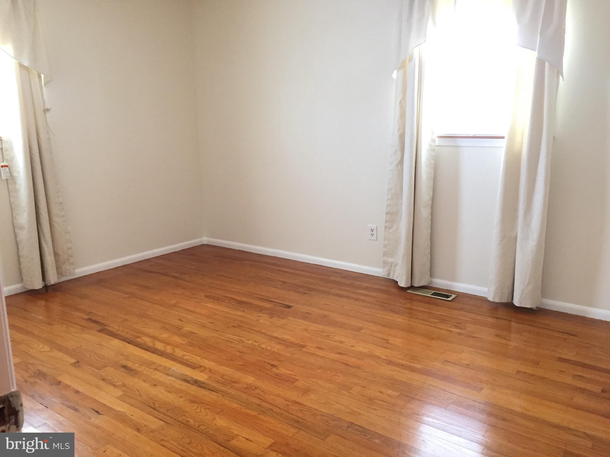 638 Hornbeam Road Edgewood, MD 21040 - Photo 8 of 14 a view of an empty room with wooden floor