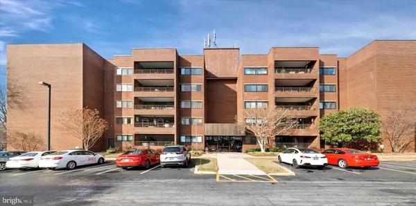 a cars parked in front of a building