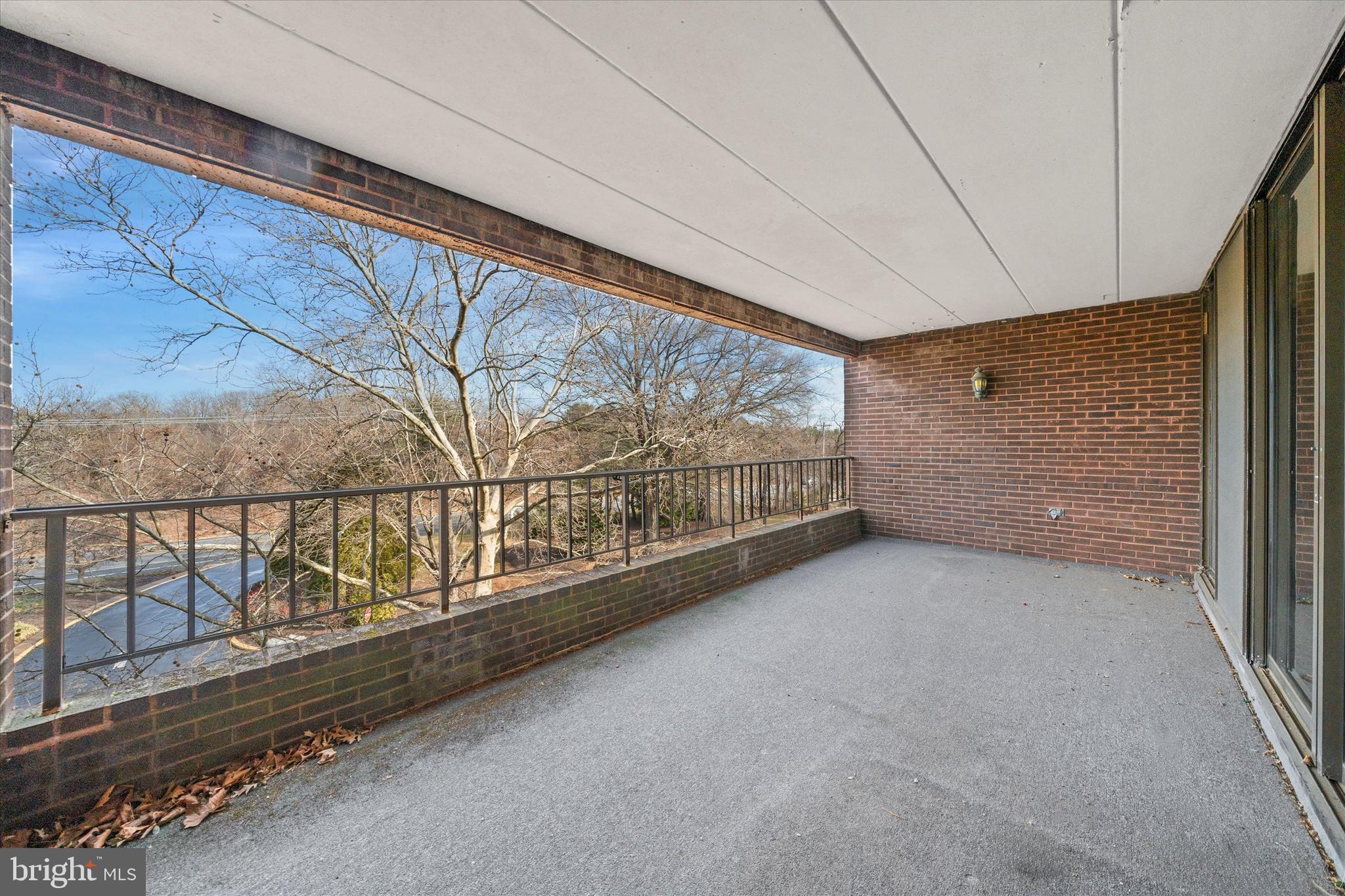614 Loveville Road, Unit C04H Hockessin, DE 19707 - Photo 32 of 36 a view of an empty room with windows