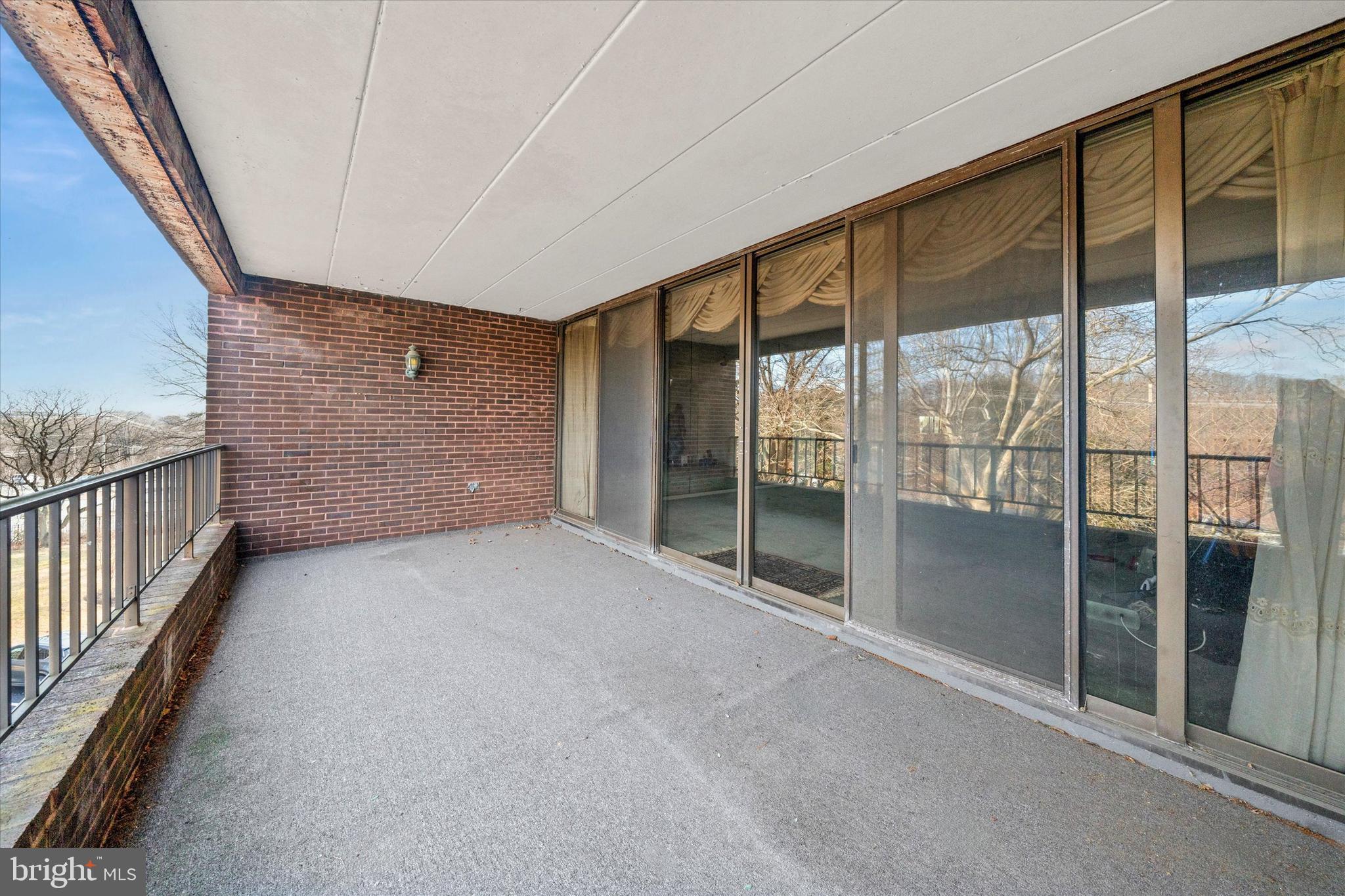 614 Loveville Road, Unit C04H Hockessin, DE 19707 - Photo 34 of 36 a view of an empty room with sliding glass door