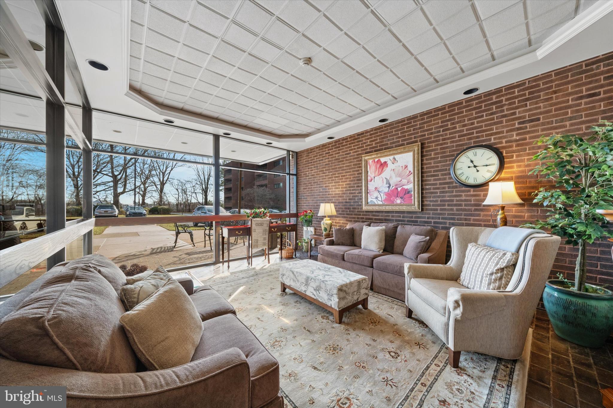614 Loveville Road, Unit C04H Hockessin, DE 19707 - Photo 36 of 36 a living room with furniture and a large window