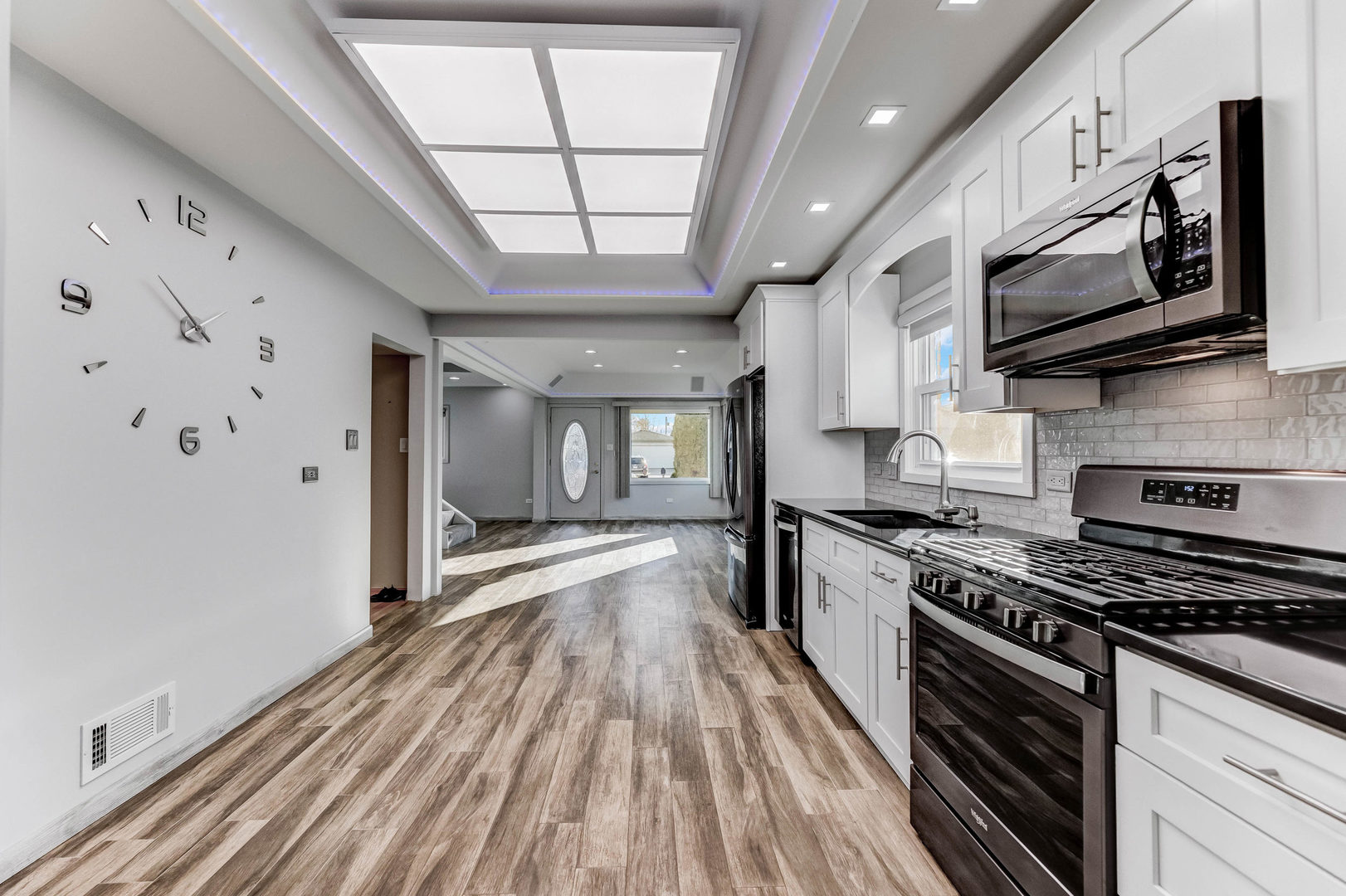 7806 West 83rd Street Bridgeview, IL 60455 - Photo 14 of 53 a kitchen with stainless steel appliances granite countertop a stove and a refrigerator
