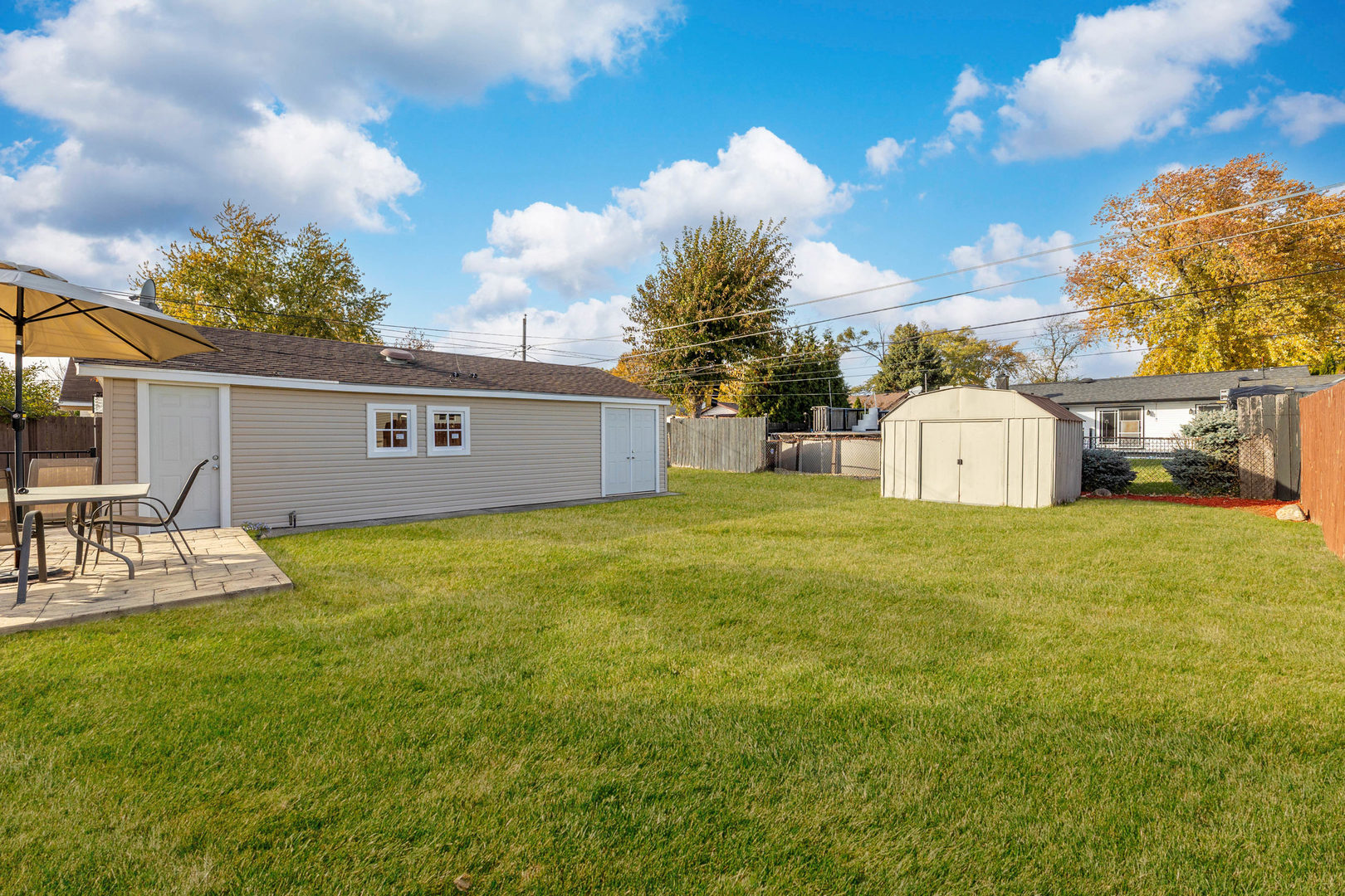 7806 West 83rd Street Bridgeview, IL 60455 - Photo 41 of 53 a view of a house with backyard and garden