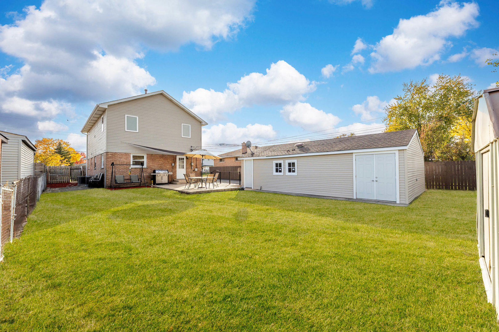 7806 West 83rd Street Bridgeview, IL 60455 - Photo 42 of 53 a front view of house with yard and entertaining space