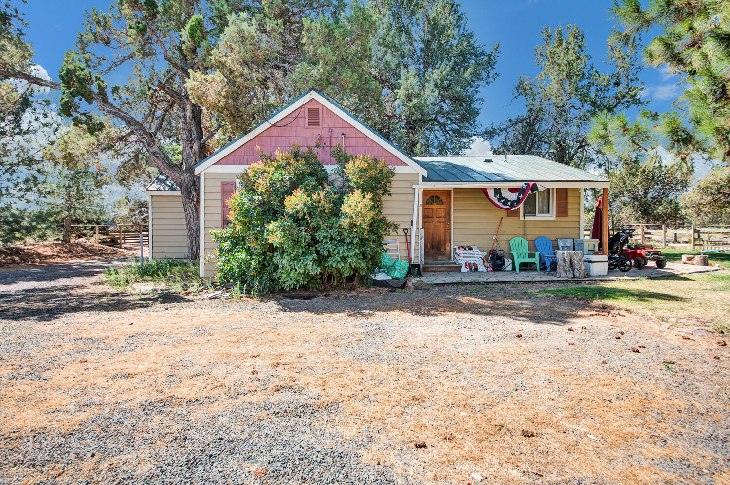 67100 Fryrear Road Bend, OR 97703 - Photo 8 of 38 a front view of a house with a yard