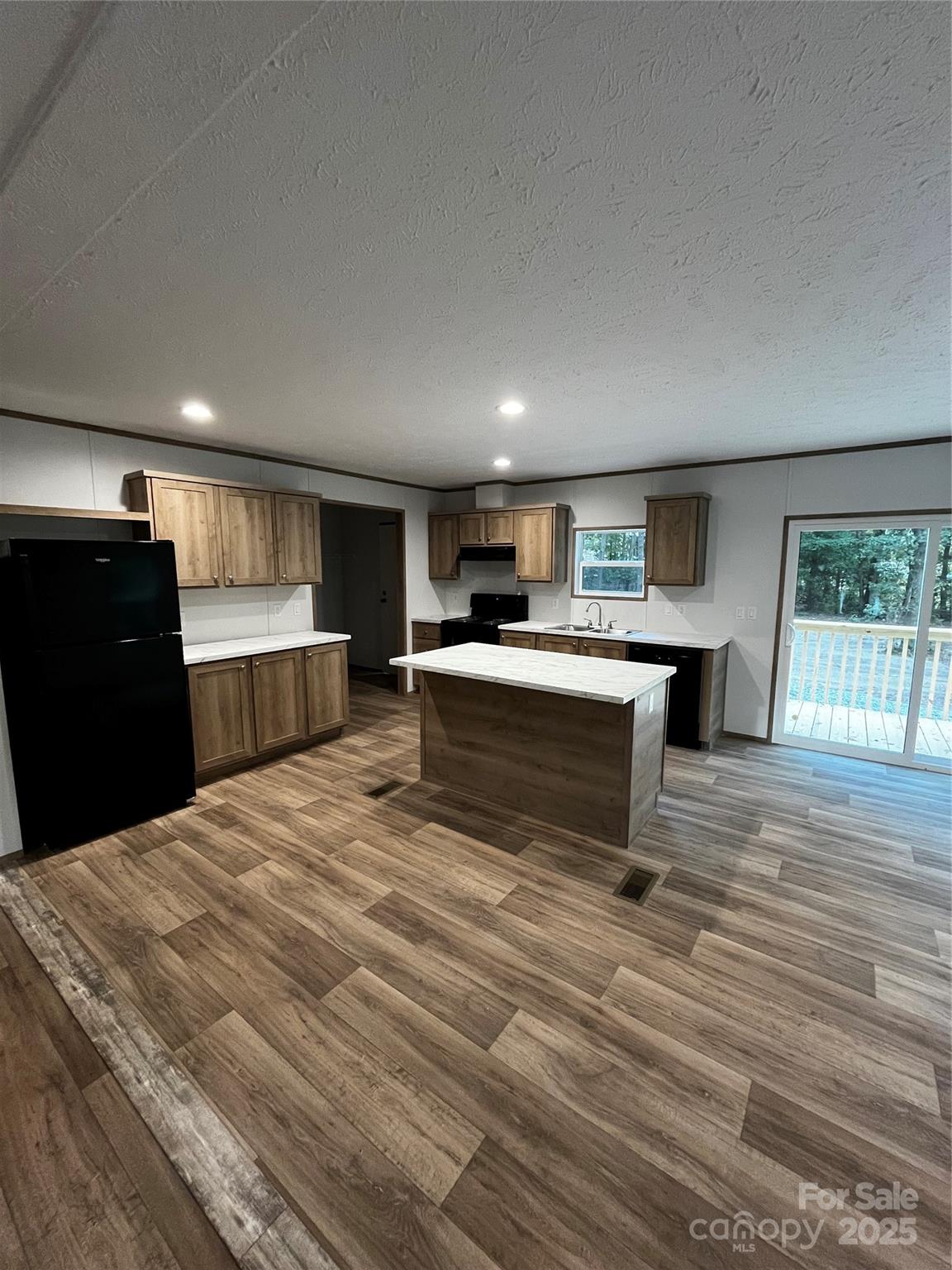 181 Duncan Road Pageland, SC 29728 - Photo 5 of 11 a room with a bed and furniture