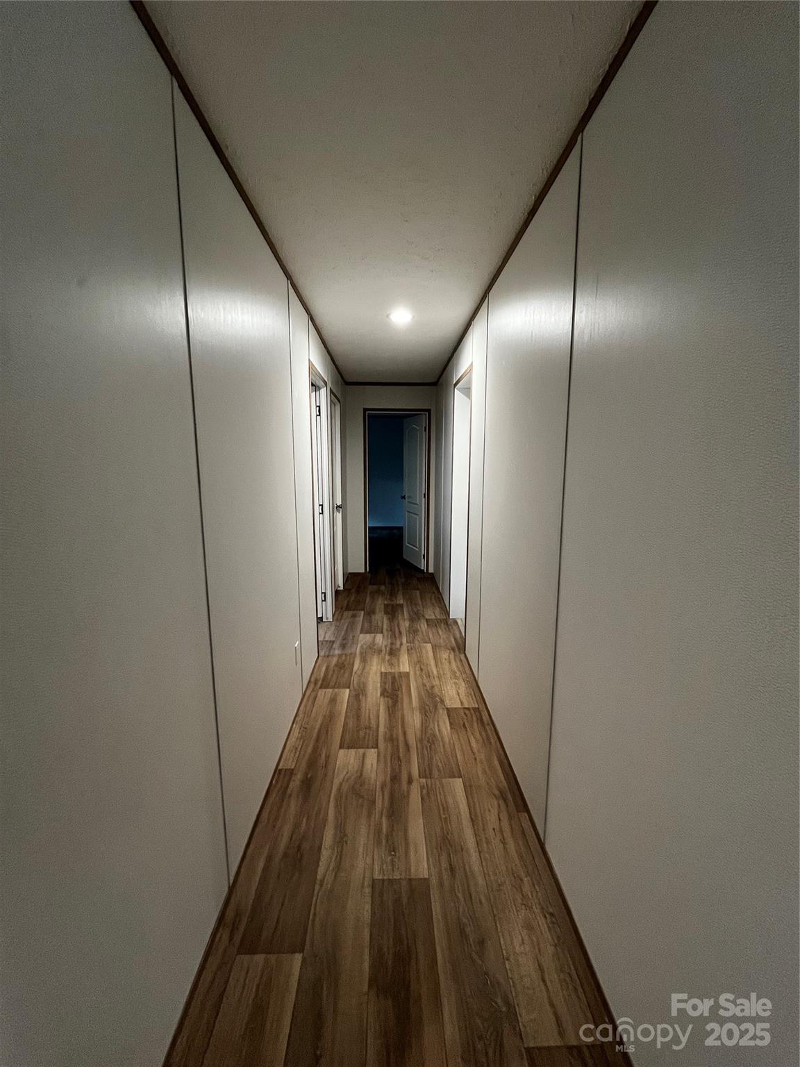 181 Duncan Road Pageland, SC 29728 - Photo 7 of 11 a view of hallway with wooden floor