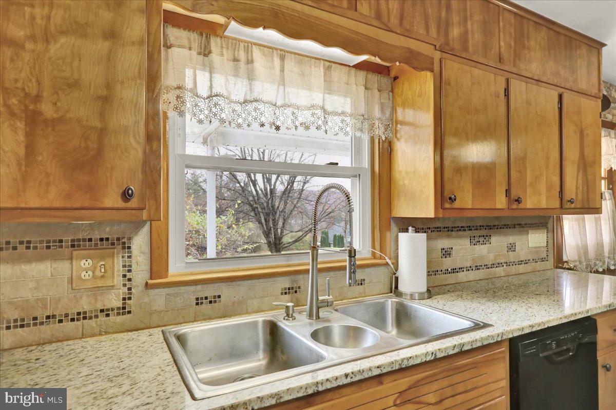 508 American Legion Boulevard Pine Grove, PA 17963 - Photo 11 of 40 a bathroom with a sink and a mirror
