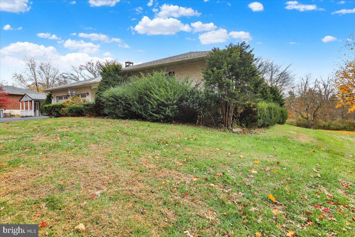 508 American Legion Boulevard Pine Grove, PA 17963 - Photo 2 of 40 a view of a garden with a building in the background