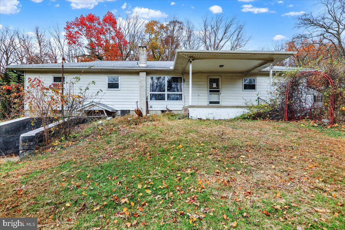 508 American Legion Boulevard Pine Grove, PA 17963 - Photo 34 of 40 a view of a house with a small yard and wooden fence