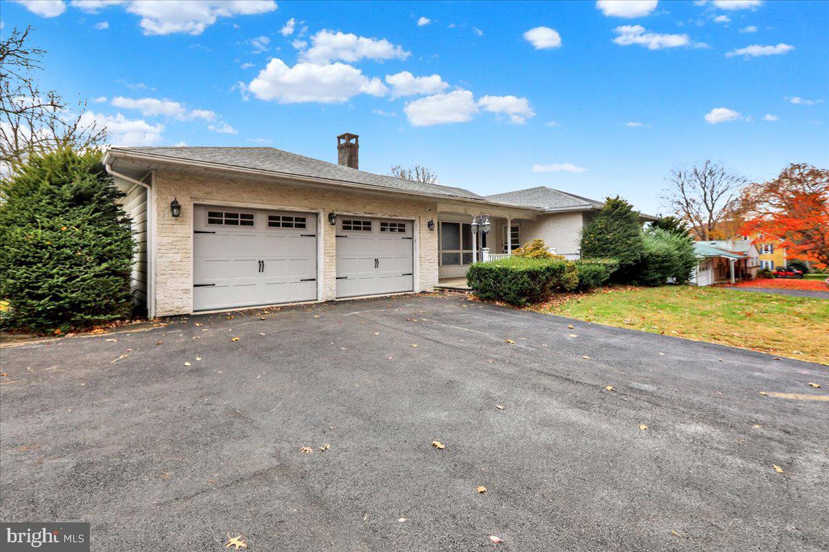 508 American Legion Boulevard Pine Grove, PA 17963 - Photo 4 of 40 a view of a house with a yard and garage