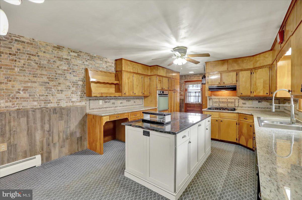 508 American Legion Boulevard Pine Grove, PA 17963 - Photo 8 of 40 a kitchen with stainless steel appliances granite countertop a stove and a sink