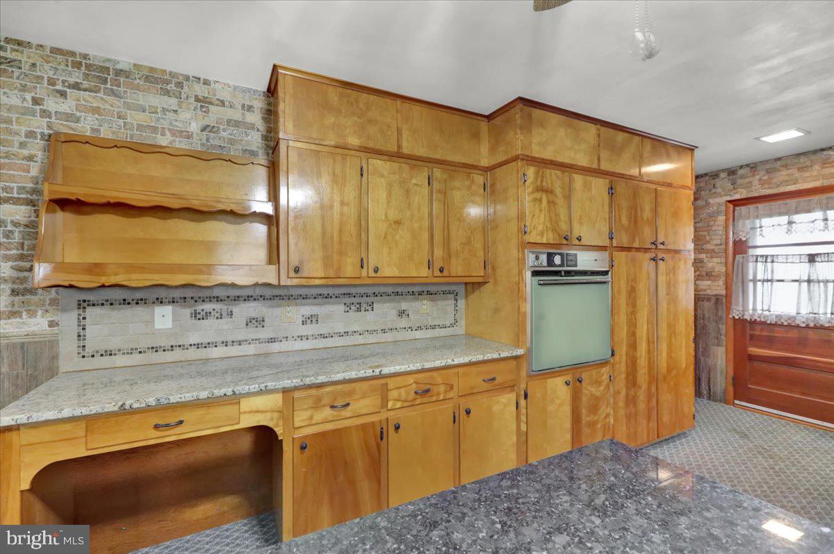 508 American Legion Boulevard Pine Grove, PA 17963 - Photo 9 of 40 a bathroom with a sink a mirror and a shower