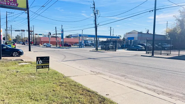 a swimming pool with yard and outdoor seating