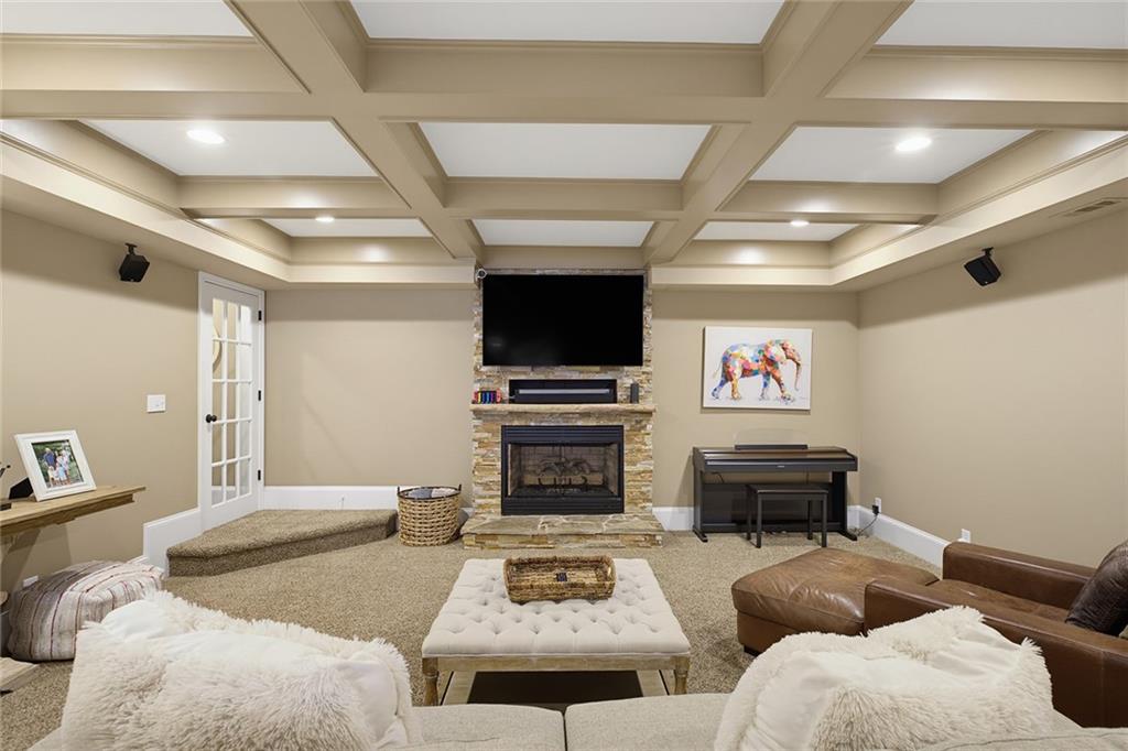 14442 Club Circle Milton, GA 30004 - Photo 47 of 82 a living room with furniture and a flat screen tv