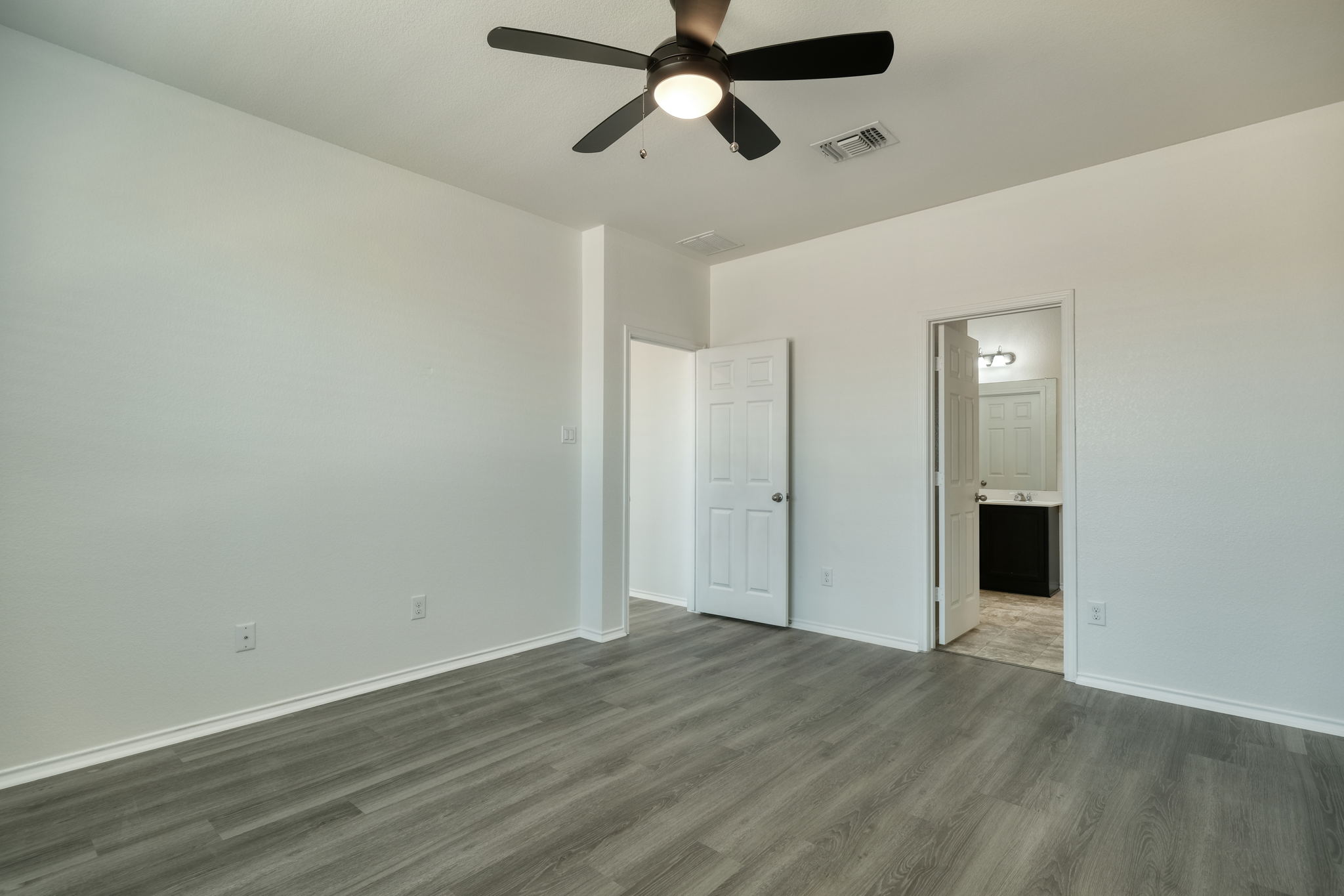 13813 James Garfield Street Manor, TX 78653 - Photo 11 of 13 wooden floor in an empty room