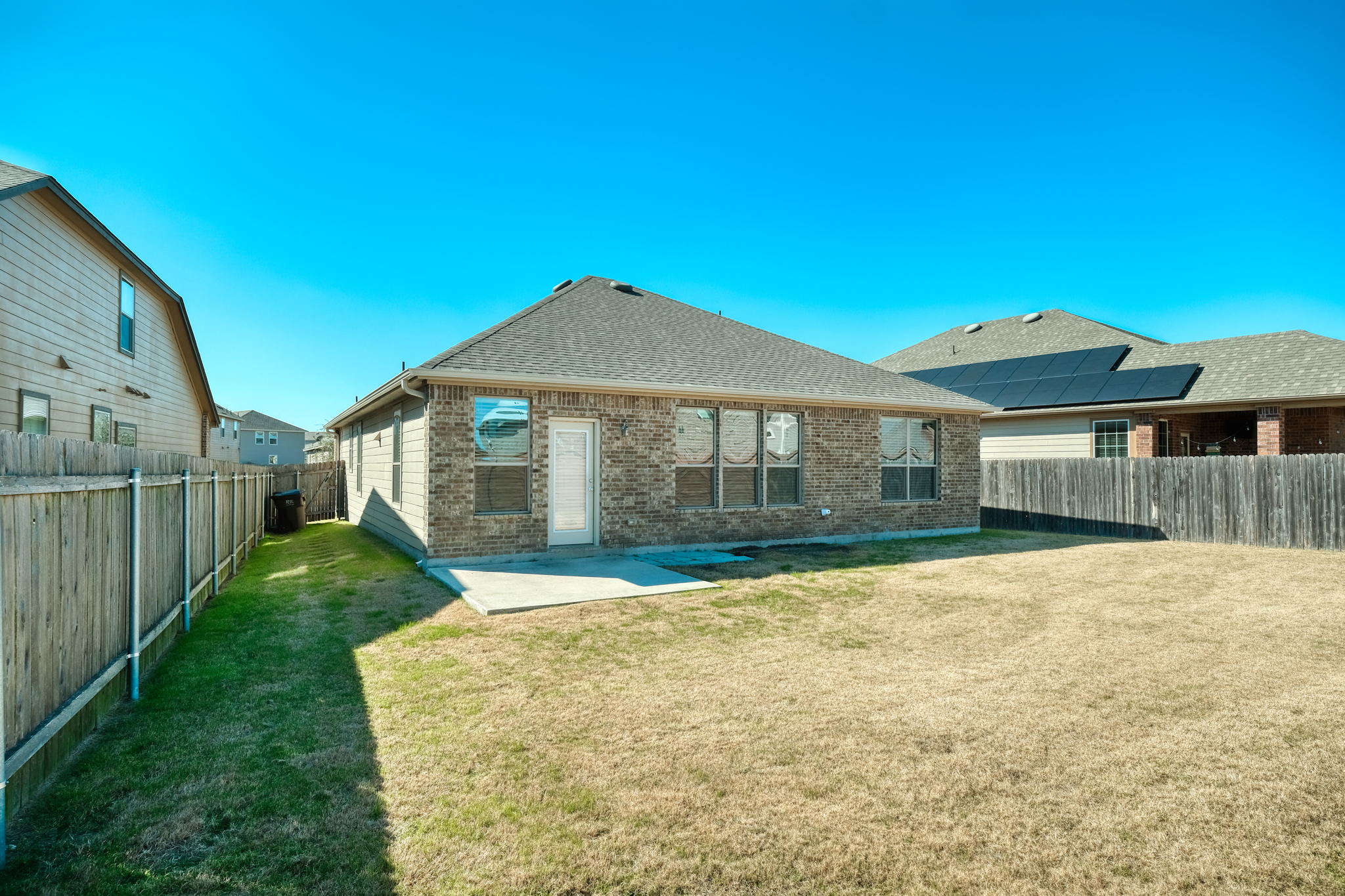 13813 James Garfield Street Manor, TX 78653 - Photo 2 of 13 a view of a house with a yard