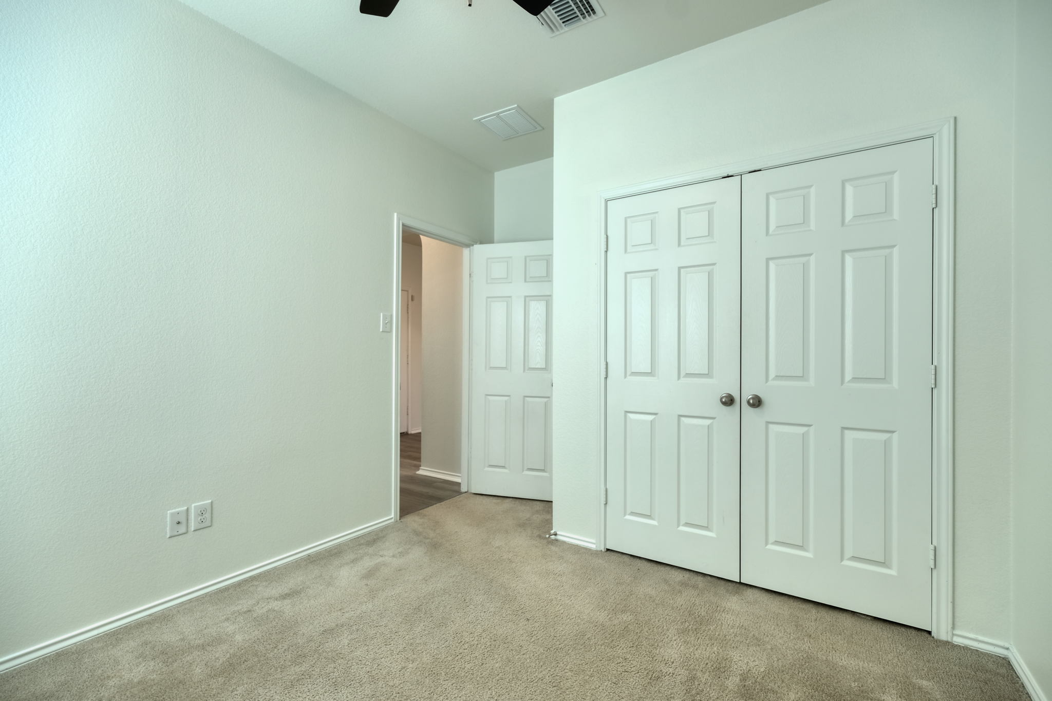 13813 James Garfield Street Manor, TX 78653 - Photo 5 of 13 a view of an empty room