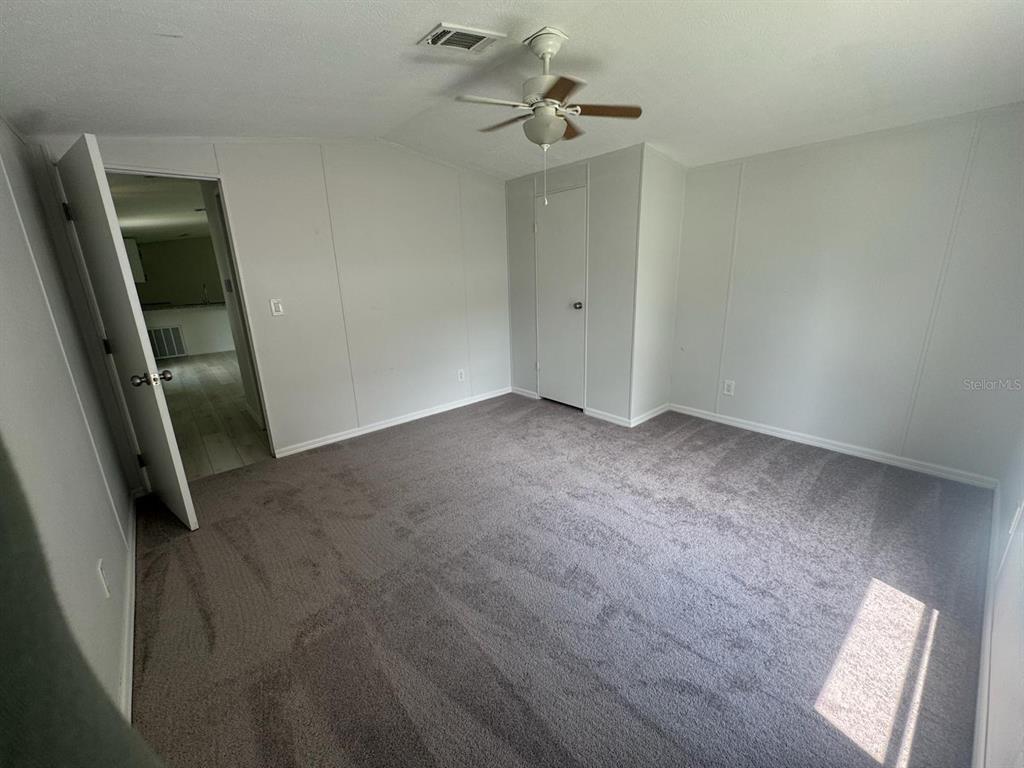 9053 Bourbon Street New Port Richey, FL 34654 - Photo 11 of 27 a view of an empty room