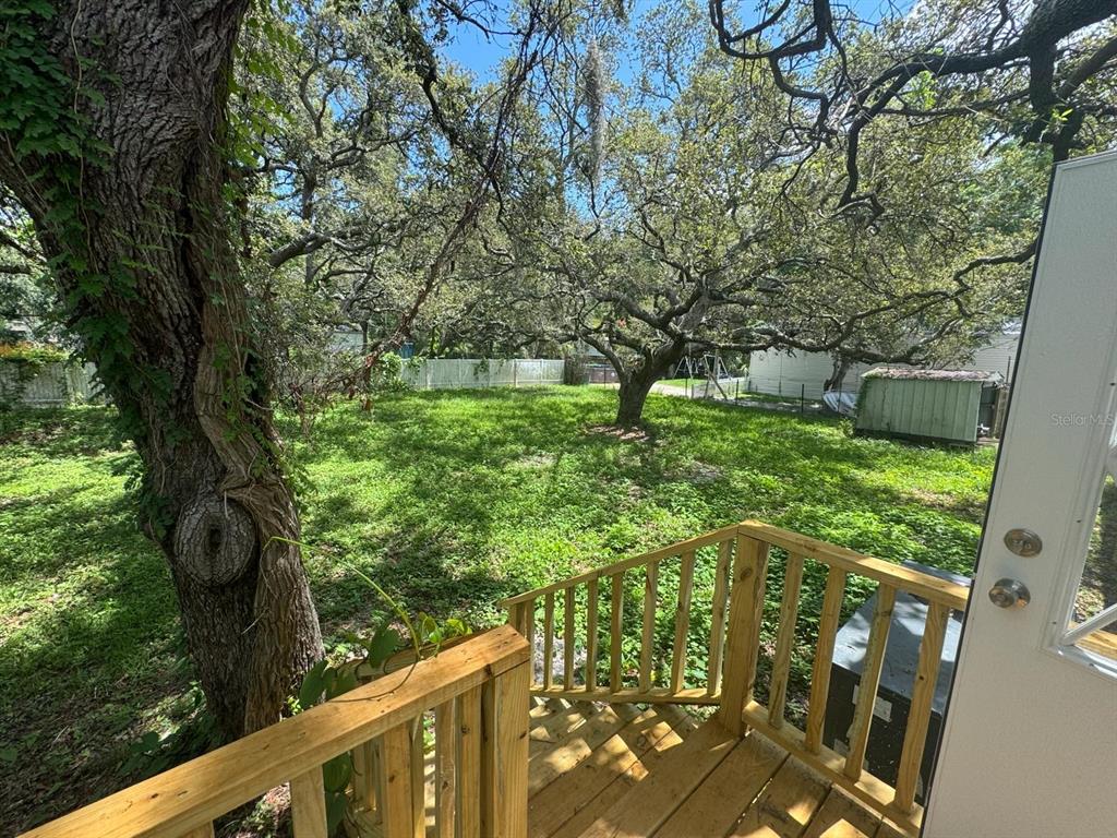 9053 Bourbon Street New Port Richey, FL 34654 - Photo 21 of 27 a view of yard from deck