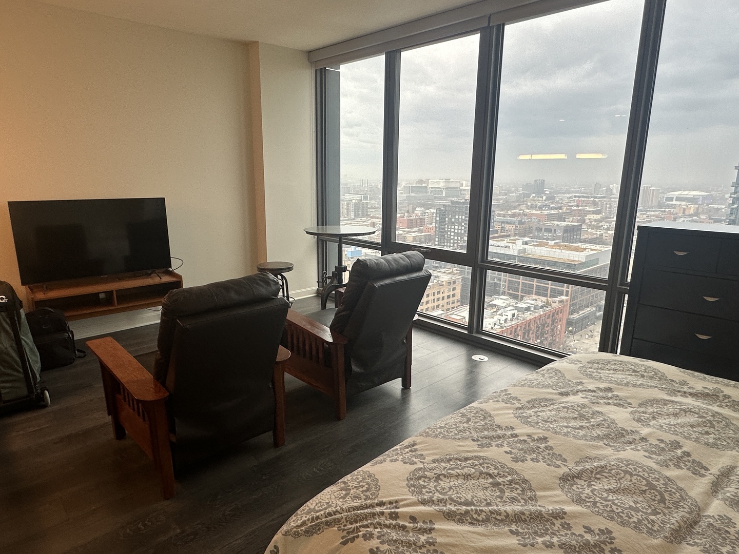 164 North Peoria Street, Unit 2801 Chicago, IL 60607 - Photo 15 of 16 a bedroom with a bed and large windows