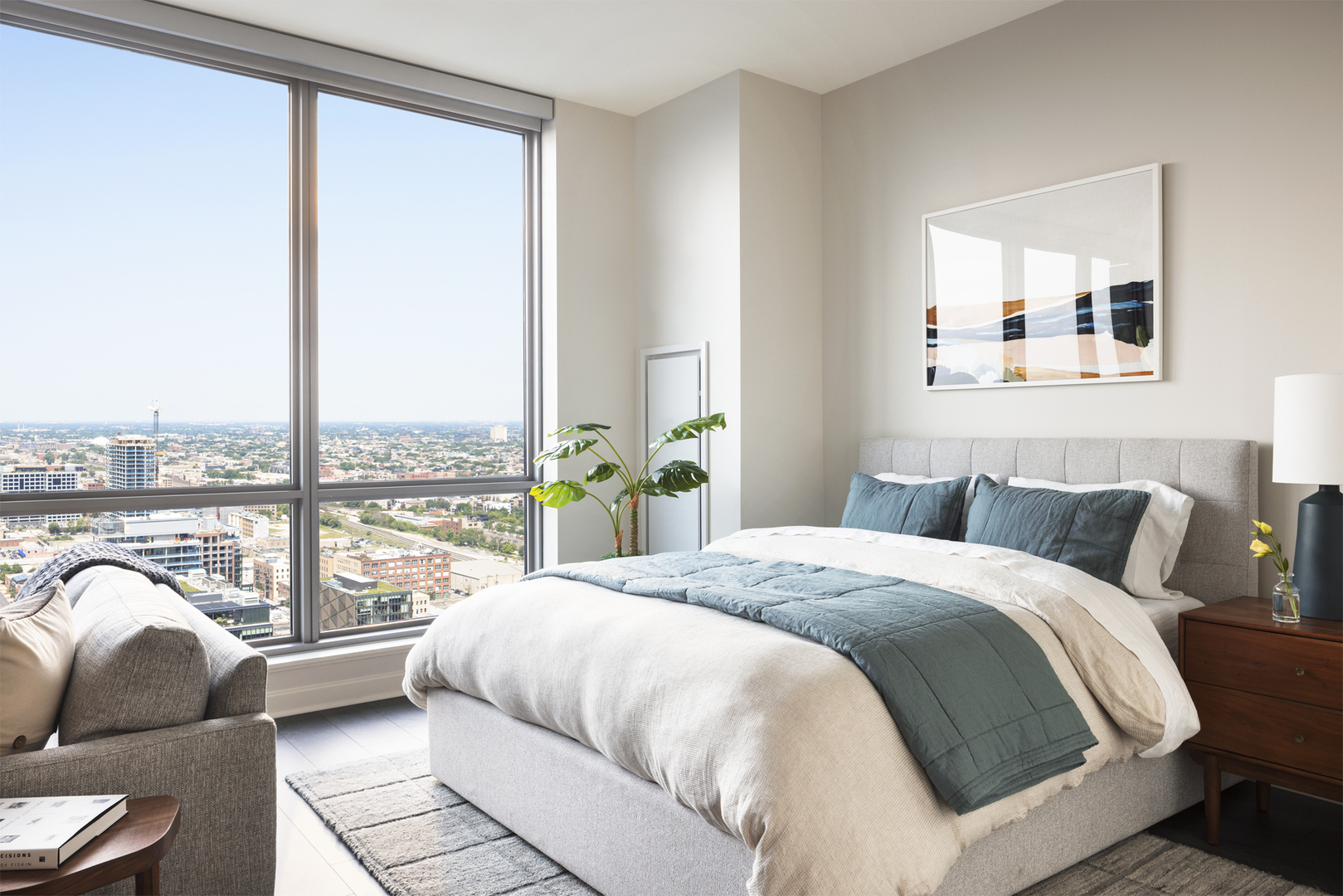 164 North Peoria Street, Unit 2801 Chicago, IL 60607 - Photo 2 of 16 a bedroom with a bed and a large window