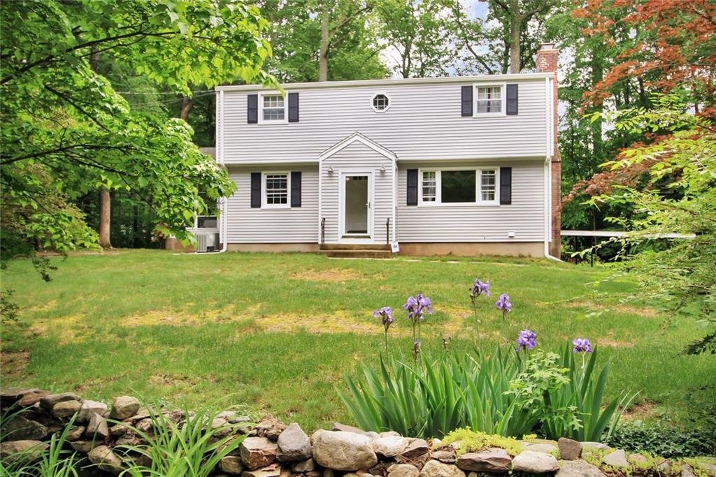 25 Geneva Road Norwalk, CT 06850 - Photo 1 of 1 a front view of a house with garden
