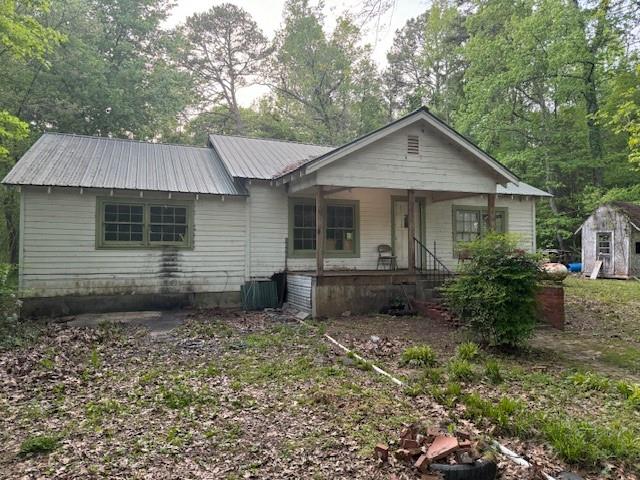 99 North Harrison Street Southwest Rome, GA 30161 - Photo 1 of 1 a view of a house with a yard and plants