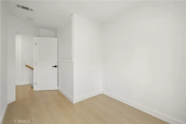 a bathroom with a sink a mirror and shower